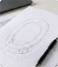 Illustrative toilet-seat concept sketch from the existing engineering visuals.